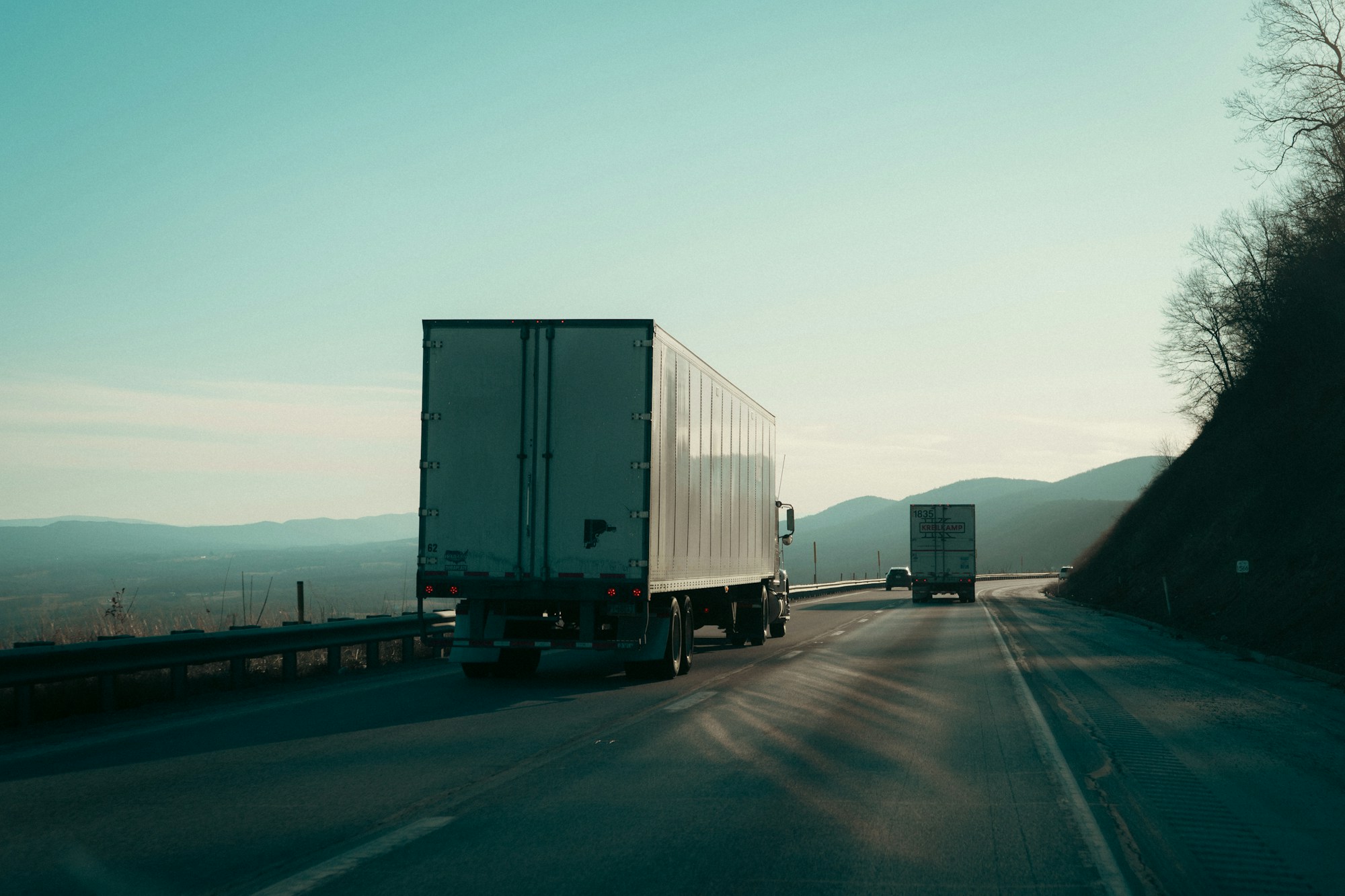 Illustrative industry photograph of tractor-trailers traveling along a Virginia highway